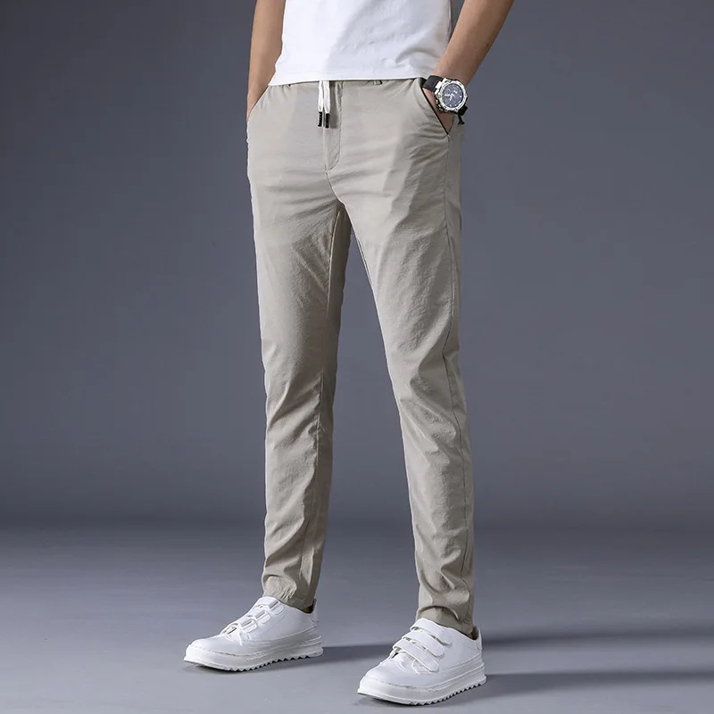 Pantaloni da uomo estivi di marca MRMT 2024 tendenza elasticizzata traspirante Super sottile per tagliare i pantaloni per pantaloni Casual da uomo con piede piccolo