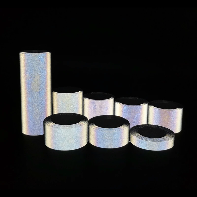 ผ้าสะท้อนแสงโพลีเอสเตอร์สีเงินสูง Roadstar วัสดุแถบสะท้อนแสงเย็บบนเสื้อเซฟตี้คําเตือนผ้าที่ชัดเจน