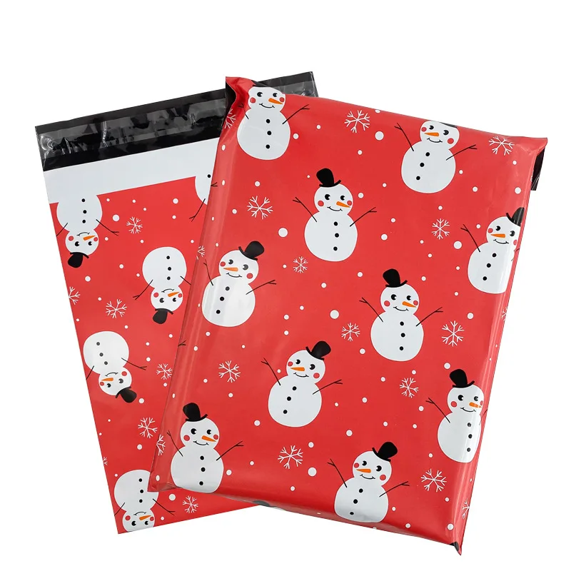 50 unidades/lotes plástico feliz natal saco de correio boneco de neve dos desenhos animados à prova dwaterproof água presentes de festa expresso storagebag mailing plástico packbag