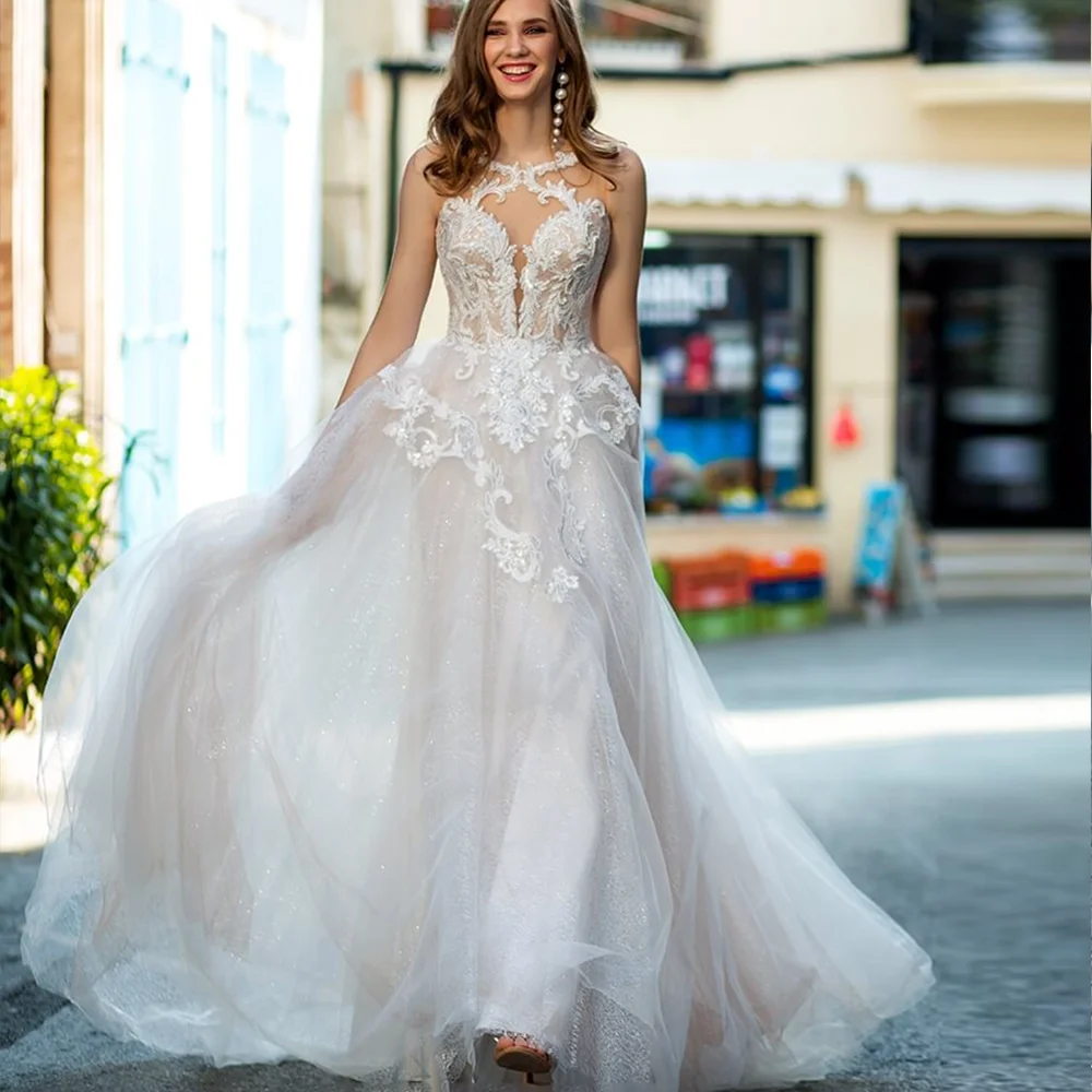 Abiti da sposa Scoop con applicazioni in Tulle brillante abiti da sposa di lusso con Glitter floreali senza maniche con illusione di grandi dimensioni su misura