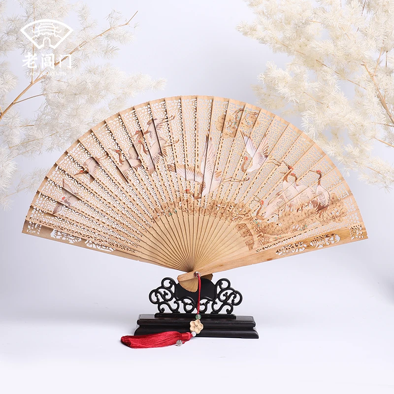 |India laoshan wingceltis sandalwood door suzhou old Chang sandalwood fan gift craft high-end fan - pine crane live