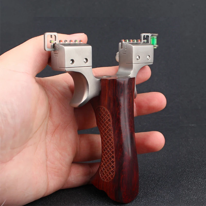

Powerful Slingshot Hunting Alloy Metal Catapult Red Wood Handle with 3 Pcs Rubber Band Outdoor Shooting Games