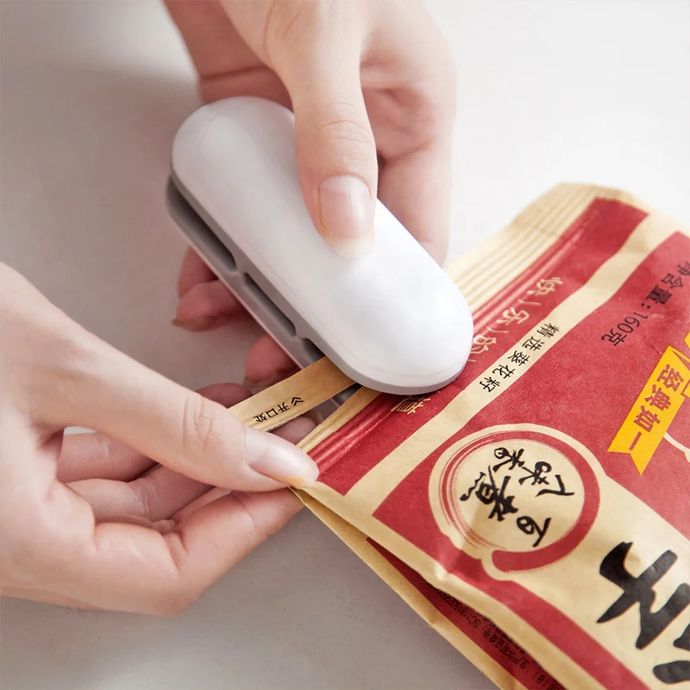 الغذاء الكهربائية ماكينة سد الفراغات الغذاء مصغرة فراغ ماكينة إغلاق محكم التوقف التعبئة والتغليف المنزلية أداة الحفاظ على التدفئة