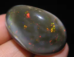 0.85ct 0.17g Gemstones-Ethiopian Black Opal Cabs Oval 7x5mm Approximatly