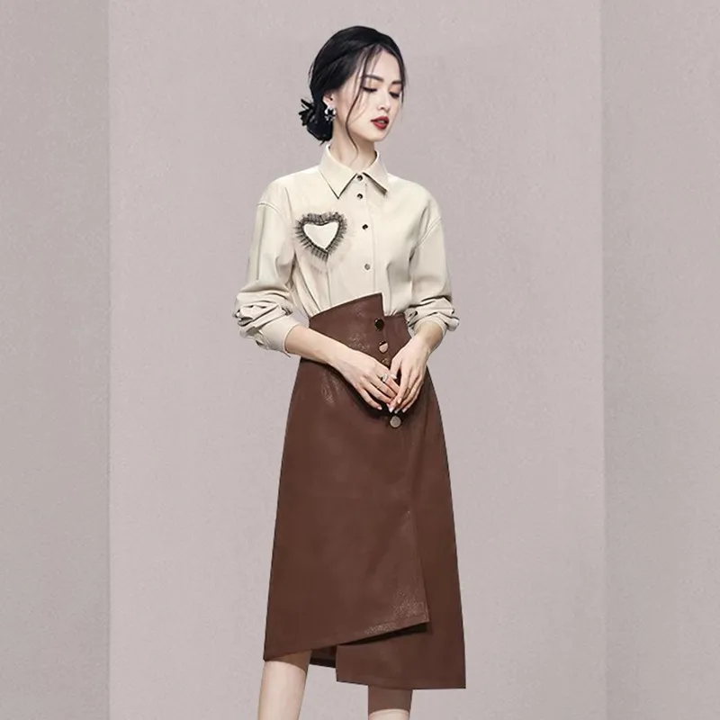 

2021 New Autumn Winter Korean Women's Two Piece Set Fashion PU Leather Long Sleeve Shirt Top + Irregular A-Line Skirt Suits