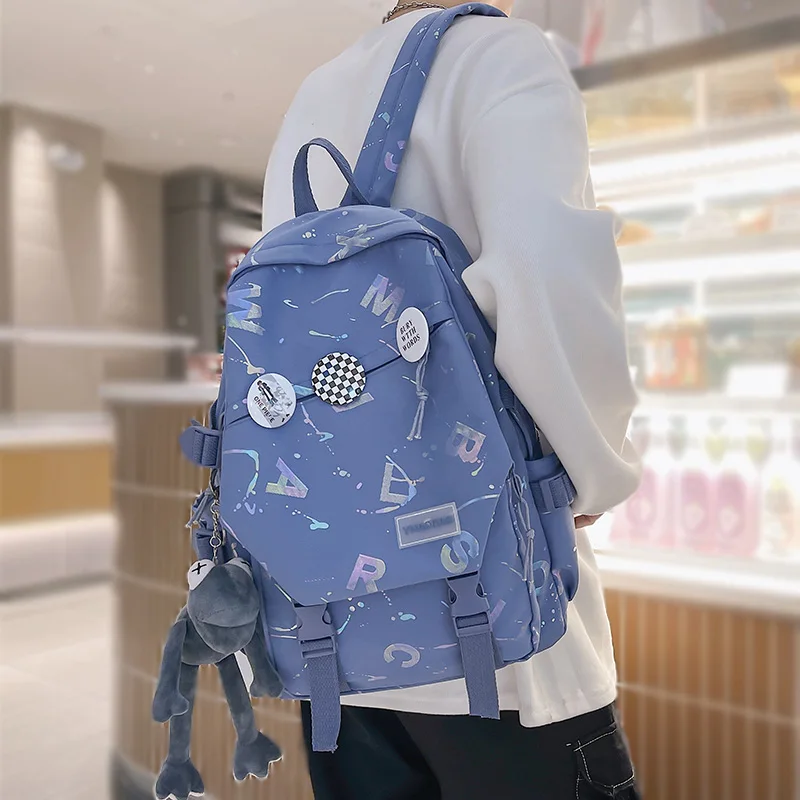 Mochila moderna de nailon para hombre y mujer, morral de viaje con diseño de grafiti para estudiantes y ordenador portátil