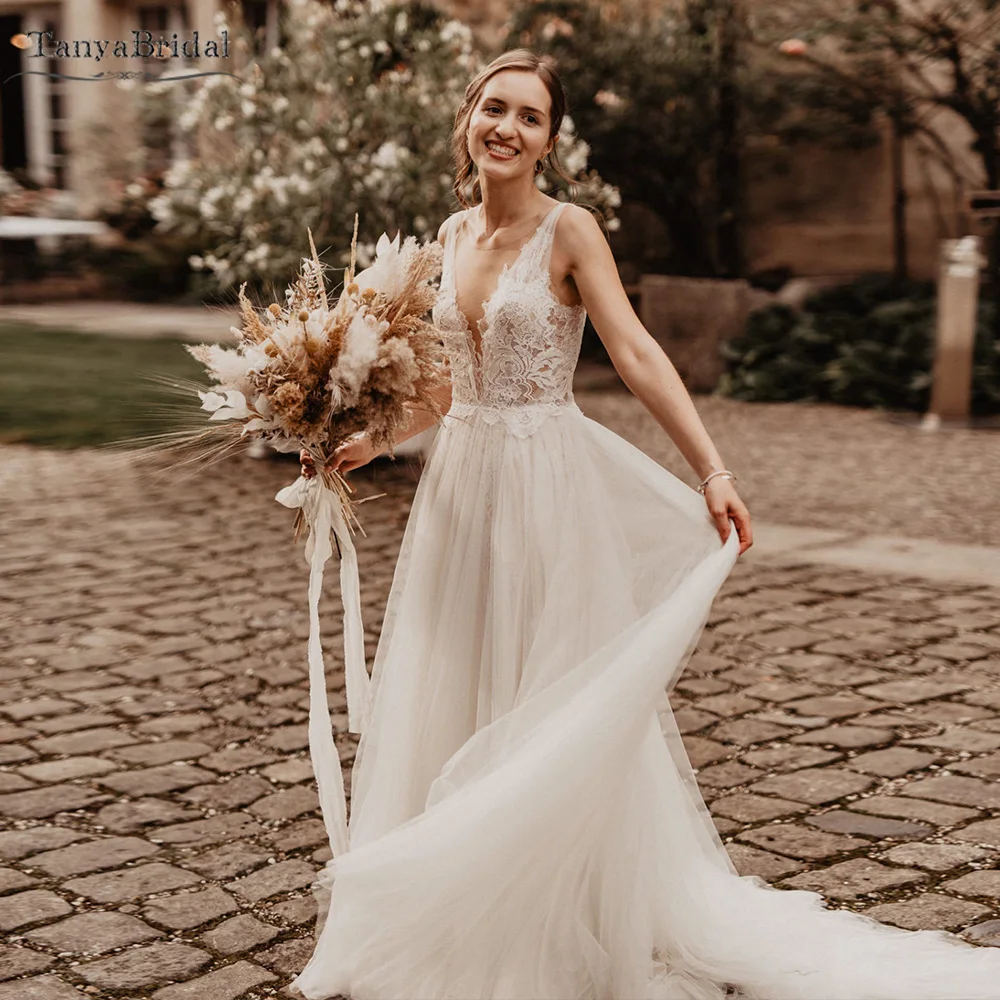 ลึกVคอชุดแต่งงานกระโปรงTulleลูกไม้Appliques Bohemianชุดเจ้าสาวBackless Beach Vestido De Noivas DW438