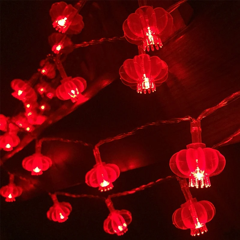 Spring Festival 2021 Red Lantern/Lantern Tassel/Carp/Peppers and Pinecone LED String Lighting with Pendant Outside in front of t