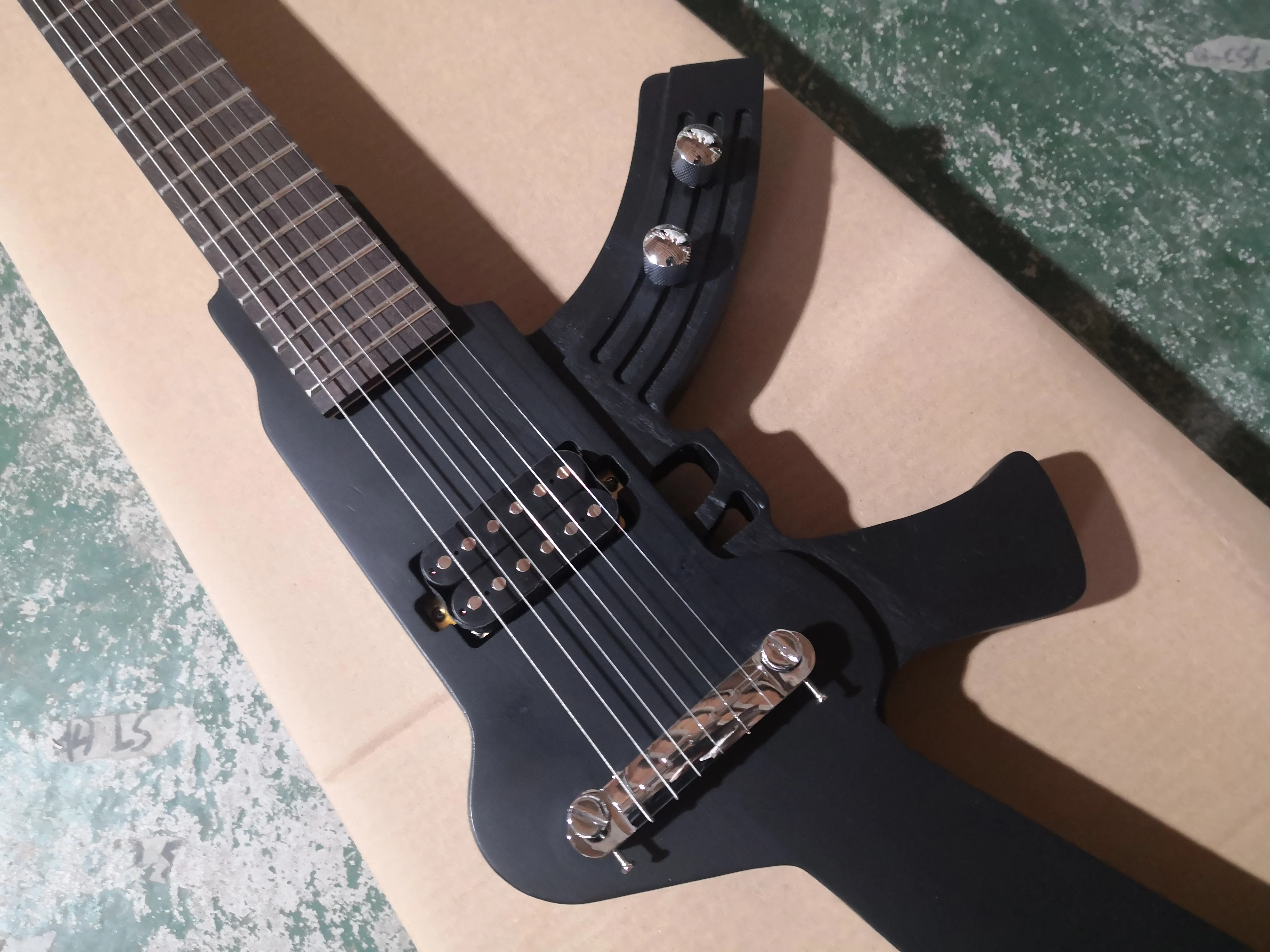 custom Gun guitar 6 string guitar,irregular metal black guitar,fixed bridge H pickups,black button,