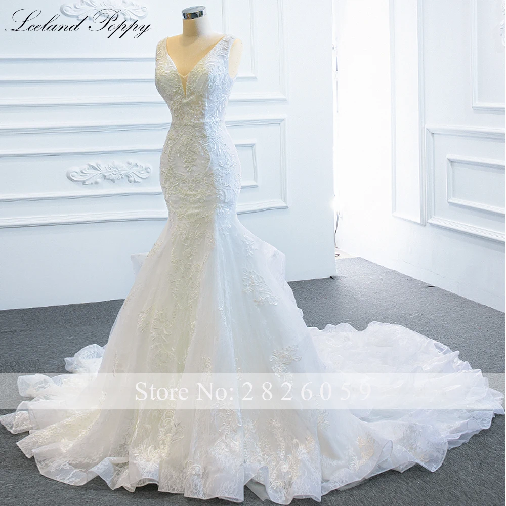 Lceland Poppy V Neck Lace Mermaid Wedding Dresses Floor Length Sleeveless Ruffled Bridal Gowns Chapel Train with Open Back