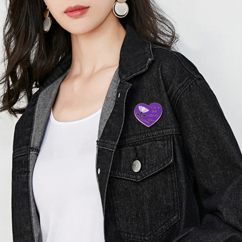 Megara heart shaped pin with a classic quote from Hercules