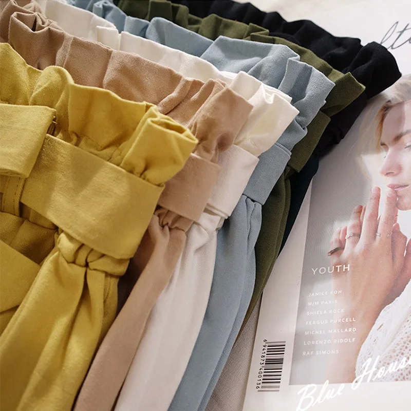 الصيف الخريف التنانير النسائية 2023 ميدي طول الركبة الكورية أنيقة زر تنورة عالية الخصر الإناث مطوي تنورة المدرسة