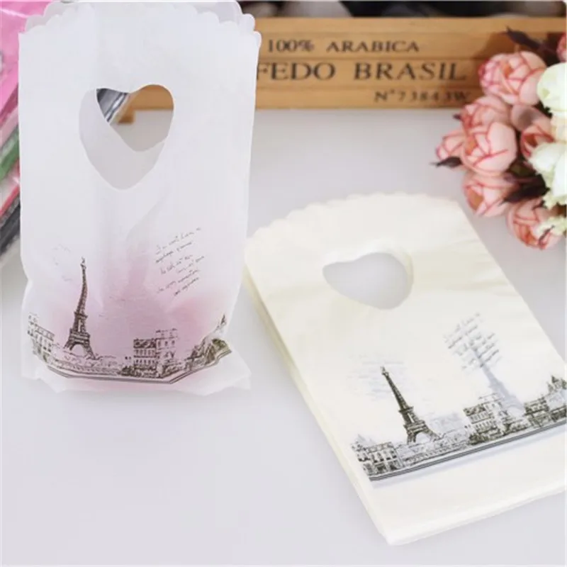 

Hot Sale New Style Wholesale 50pcs/lot Eiffel Tower Mini Jewelry Plastic Gift Packaging Bags With Handles Small Gift Bags
