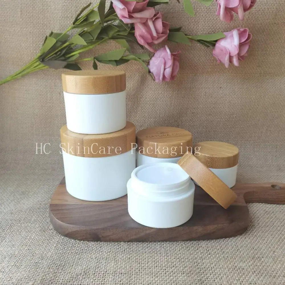 Wholesale Cosmetic Face Cream Jar With Bamboo Wood Lid White PP Plastic 8OZ Containers Skin Care Packaging Jars Custom Logo Jars