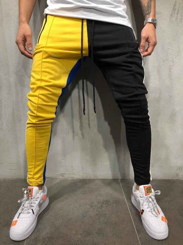 

New 2021 color trend men's color matching design personalized sports pants hip-hop style slimming tide brand trousers fitness