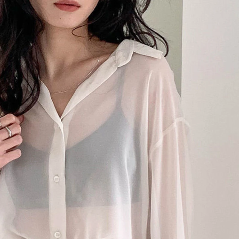 Camisas de mujer transparentes a prueba de sol moda verano elegante prendas de vestir exteriores Simple sólido todo-fósforo femenino manga larga cuello vuelto acogedor