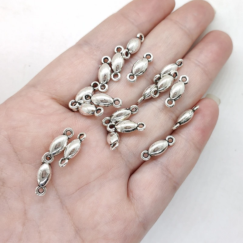 40 stück Zink-legierung Geriffelte Blume Zwei Löcher Oval Charms Anschlüsse Linker für DIY Schmuck Ohrring Halskette Zubehör