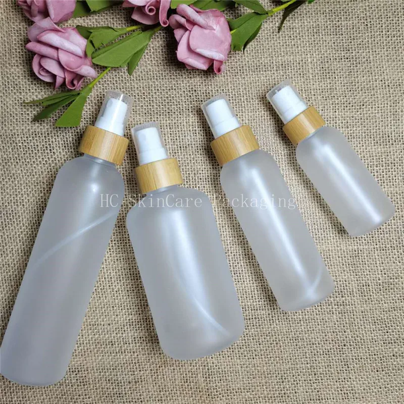 

spray bottles wholesale 60ml 120ml 150ml frosted plastic bottle Environmental bamboo lid glass bottles empty cosmetic container