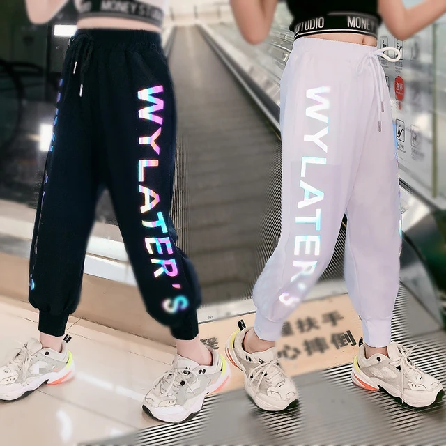 Girl in track pants sale