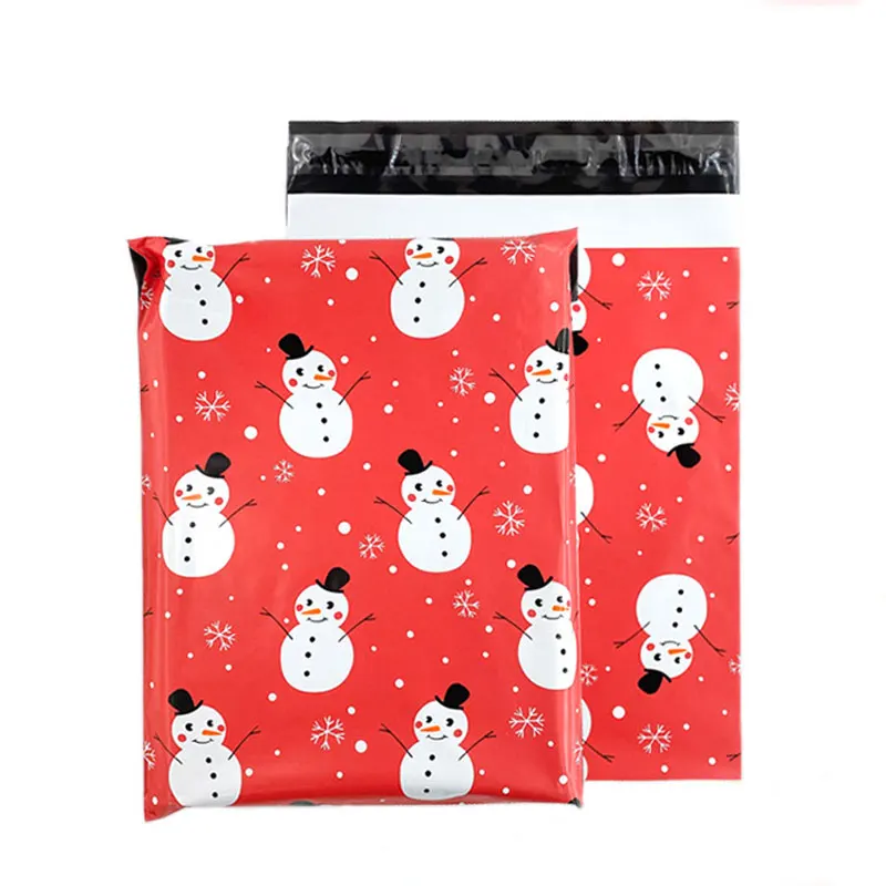 50 unidades/lotes plástico feliz natal saco de correio boneco de neve dos desenhos animados à prova dwaterproof água presentes de festa expresso storagebag mailing plástico packbag