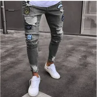 Hombres elástico rasgado ajustado Biker bordado estampado de dibujos animados Jeans desgastados agujero Slim Fit Denim alta calidad Hip Hop negro Jeans