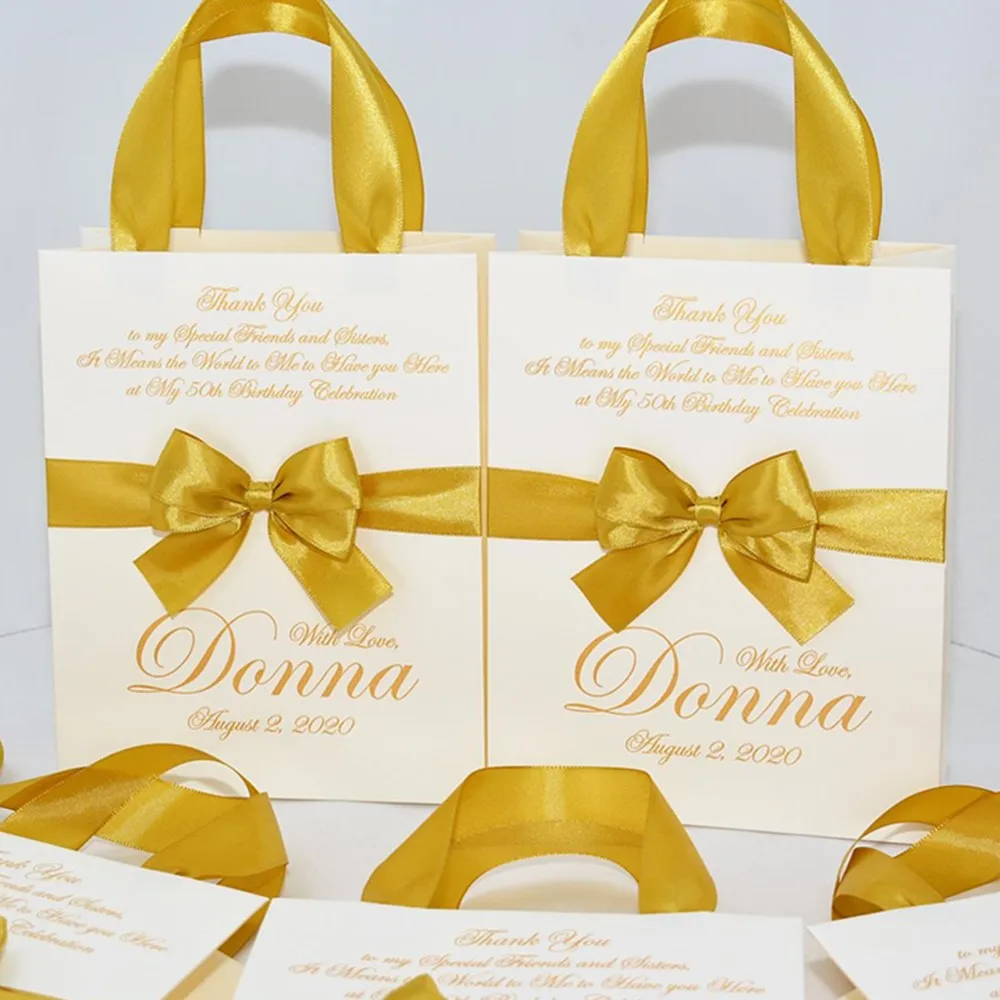 Personalized Elegant Ivory & Gold Birthday Party Bags for your guests with satin ribbon bow and custom name  Anniversary bags