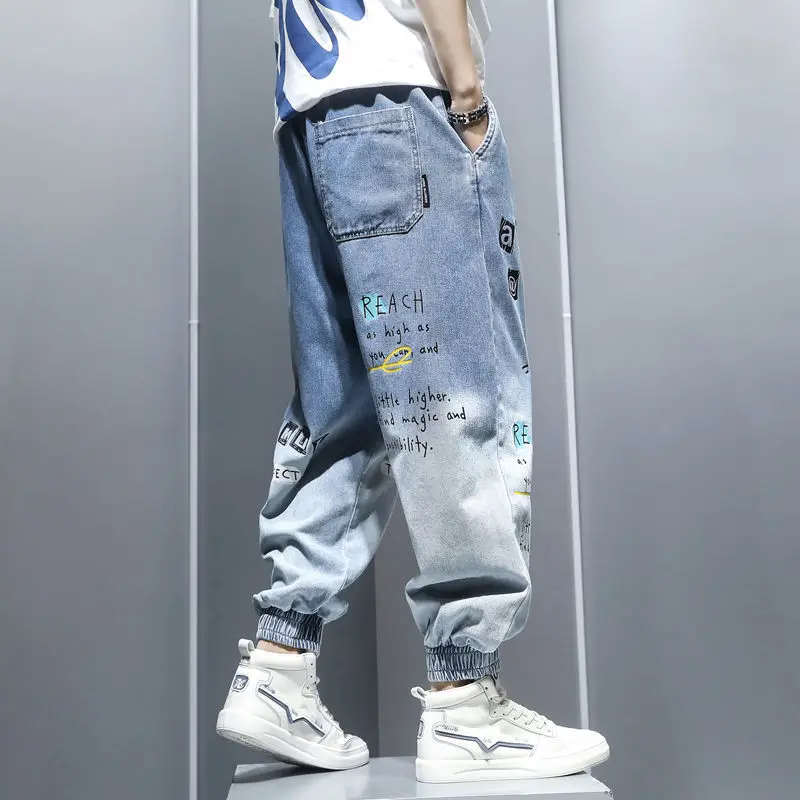 Pantalones vaqueros con estampado de grafiti para hombre, pantalones bombachos de Hip Hop degradados, sueltos, informales, con bandas en el tobillo,