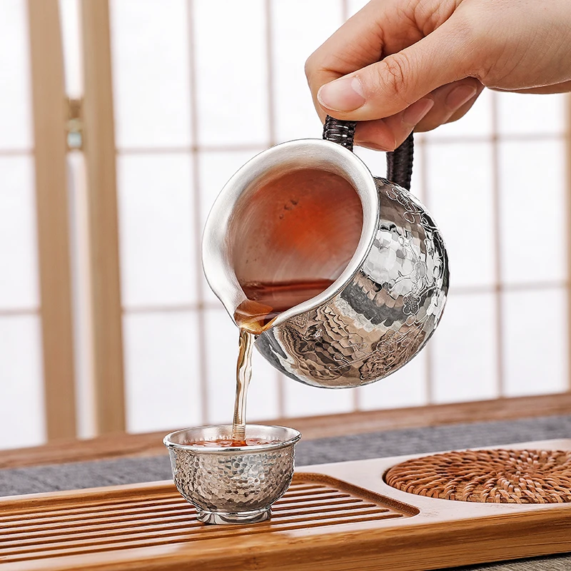 Pure silver 999 cup tea dispenser Hand-engraved plum blossom bright face Chinese silver justice cup for household use
