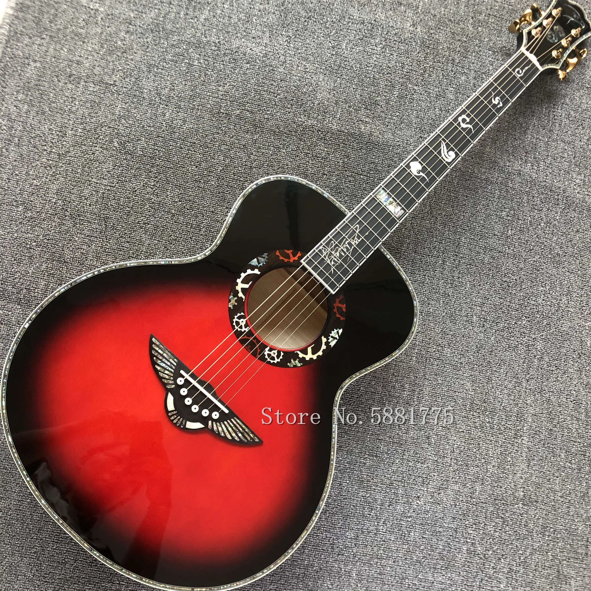 Custom acoustic guitar, solid spruce top, ebony fingerboard, real abalone shell binding and inlay, 40 inches