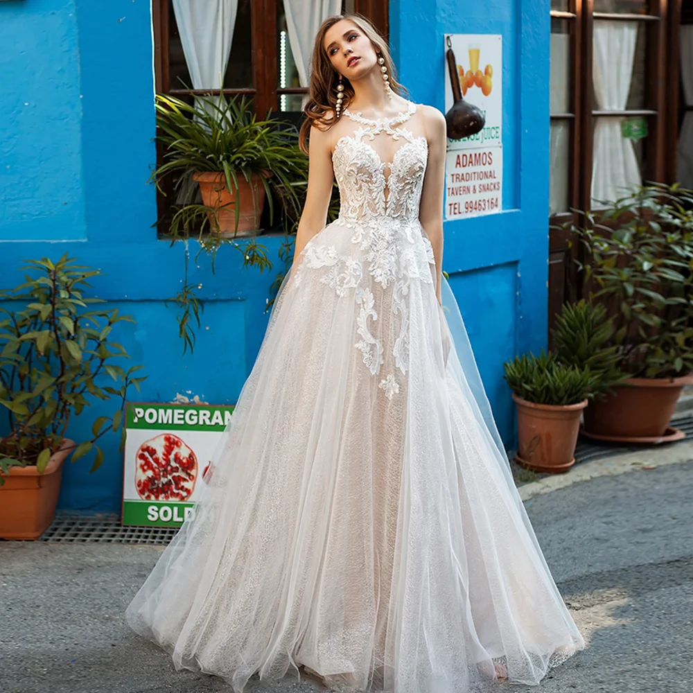 Shining Tulle Appliqued Scoop Wedding Gowns Tùy Chỉnh Thực Hiện Kích Thước Lớn Illusion Trở Lại Hoa Không Tay Long Lanh Sang Trọng Bridal Dresses