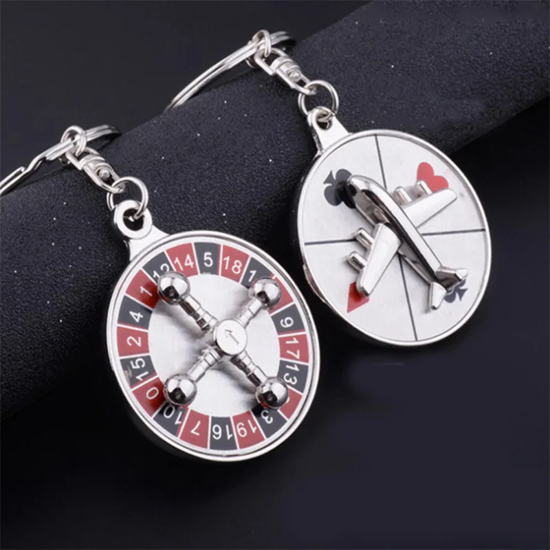 Fashion Metal Russian Roulette Keychain Jewelry Rotating Direction Disk Aircraft Airplane Compass Travel Pendant Keyring