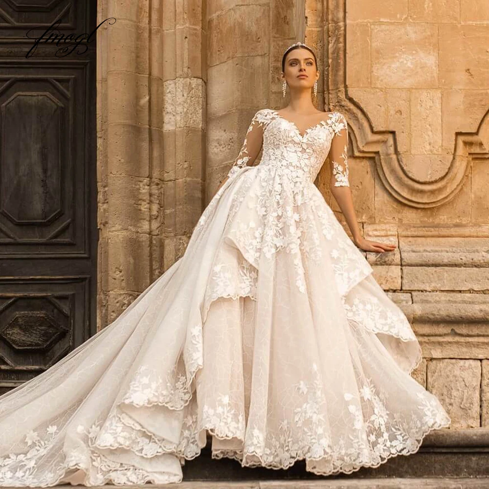 

Fmogl Sexy Backless Half Sleeve Lace Princess Wedding Dresses Scoop Neck Appliques Ruffles Court Train A Line Bride Gown