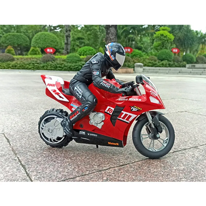 RC Stunt Motorcycl 3D หมุนพลิก2.4G รีโมทคอนโทรล Stunt Motorbike ความเร็วสูง Drift รถกันกระแทก Auto Balance ของเล่น