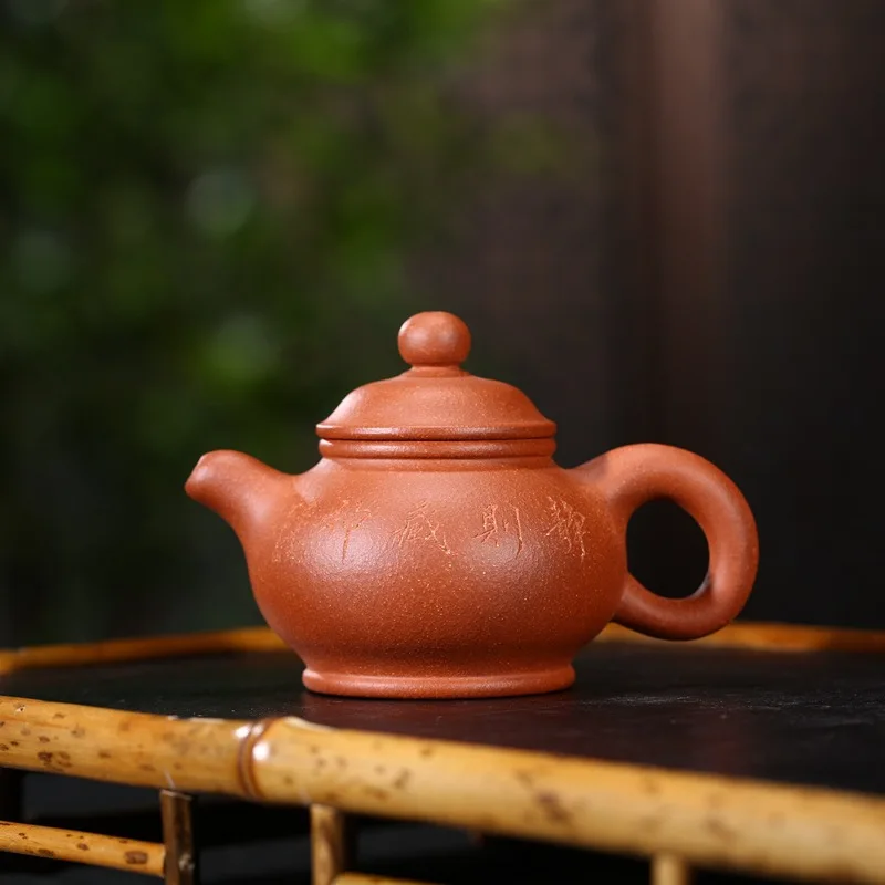 Yixing purple clay teapot is handmade, genuine Panhu raw ore downhill nixudong 130ml carved teapot