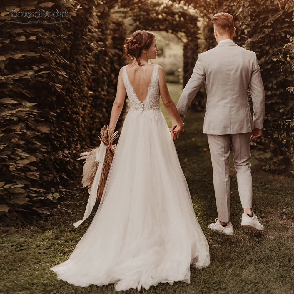 ลึกVคอชุดแต่งงานกระโปรงTulleลูกไม้Appliques Bohemianชุดเจ้าสาวBackless Beach Vestido De Noivas DW438