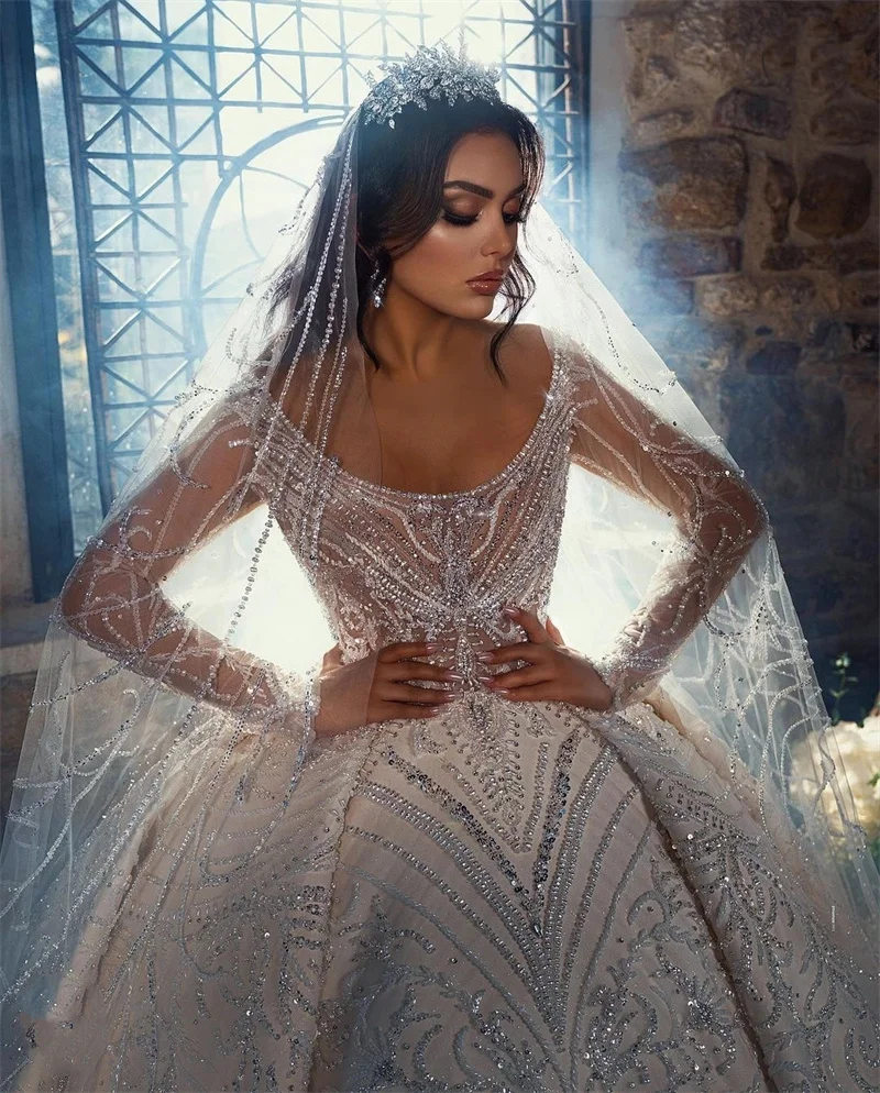 

Dubai Luxurious Pearls Wedding Dresses Beads Appliques Bridal Gowns Custom Made O Neck Long Sleeves Glitter Vestido de novia