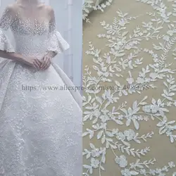 2021 Newest fashionable ivory bridal dress lace fabric 130cm width wedding gown dress lace fabric with sequins sell b yard