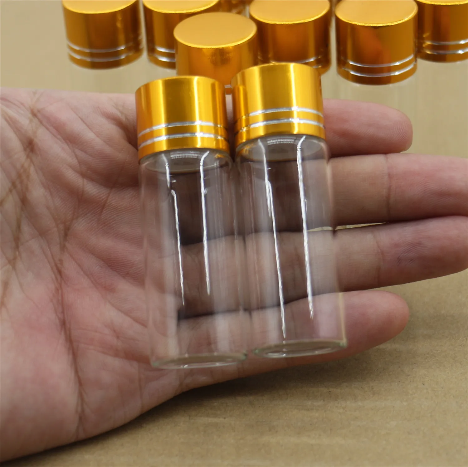 

50 pcs/lot 22*60mm 12ml Glass Bottle Golden Plastic Cap Test Tube Stopper Spice Container Small DIY glass Jars Vials