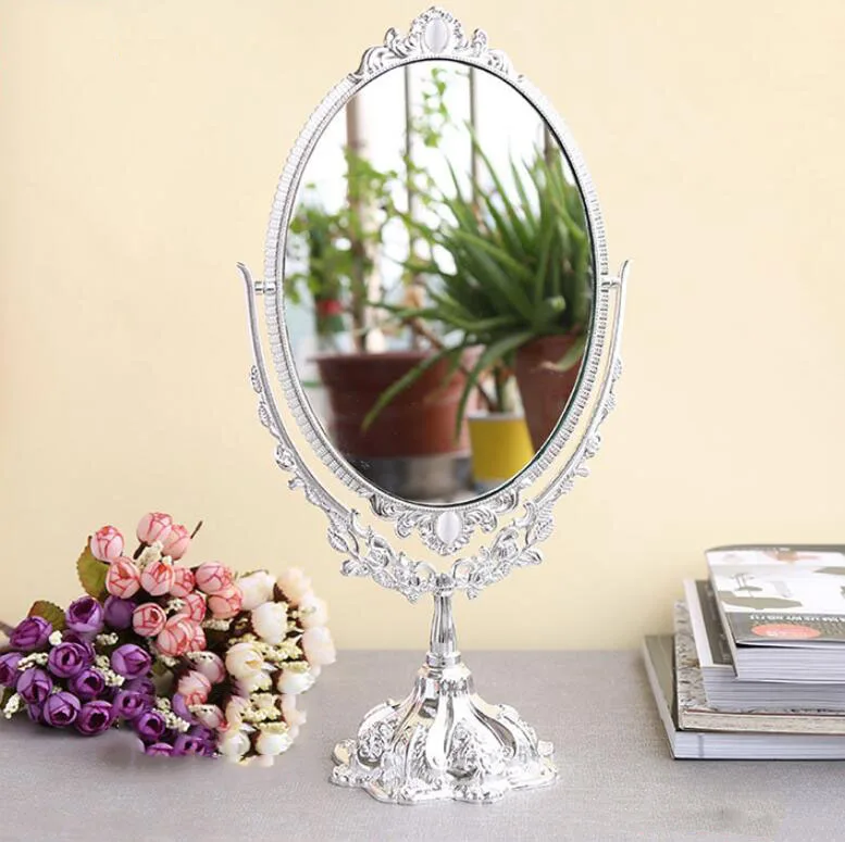 An 8-inch, high-end, european-style metal-table two-sided mirror with a mirror image of an hd desktop