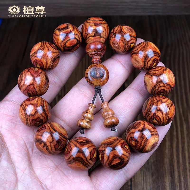 Senior face full of ghost eyes 18mm Hainan huanghuali bracelet male old material sea yellow bracelet orphan product