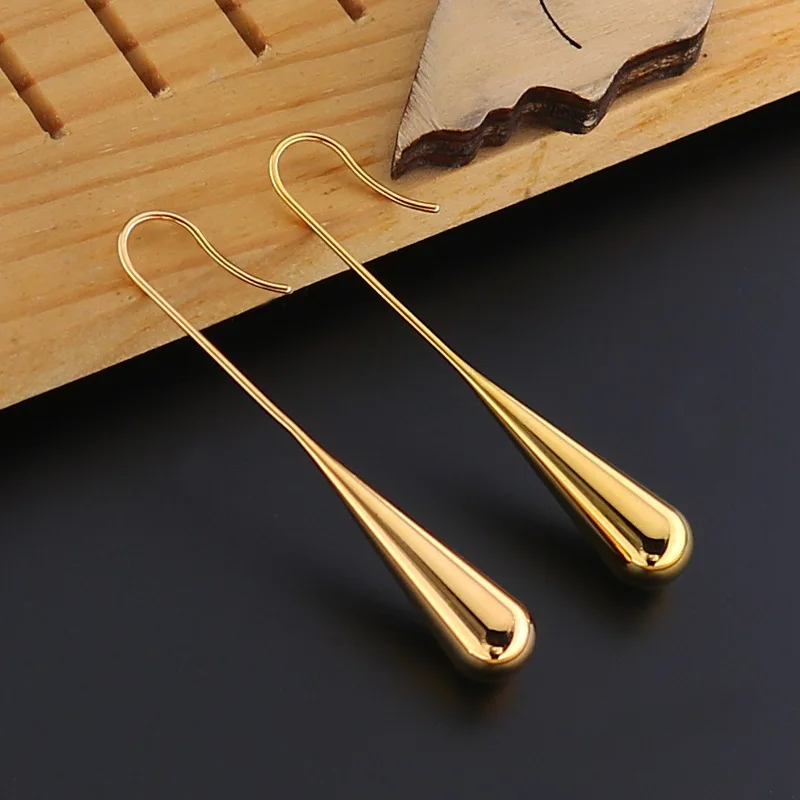 Fashion Cold Wind Titanium Steel Drop Earrings Smooth Stainless Steel Long Ear Hook Hollow  Water Drop Earrings For Women