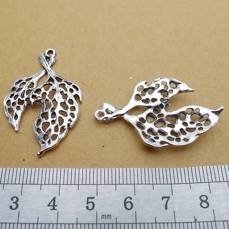 Newest 10 Pieces 23*38mm Antique Silver Color Hollow Leaf Charms Necklace Bracelet Pendant Crocs Charms For Jewelry Making