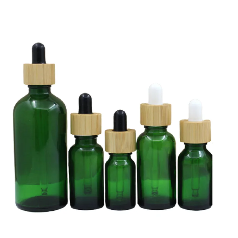 

Cosmetic Packaging Bottle Bamboo Wood Lid Rubber Top 5ml 10ml 15ml 20ml 30ml 50ml 100ml Empty Green Glass Essential Oil Vials