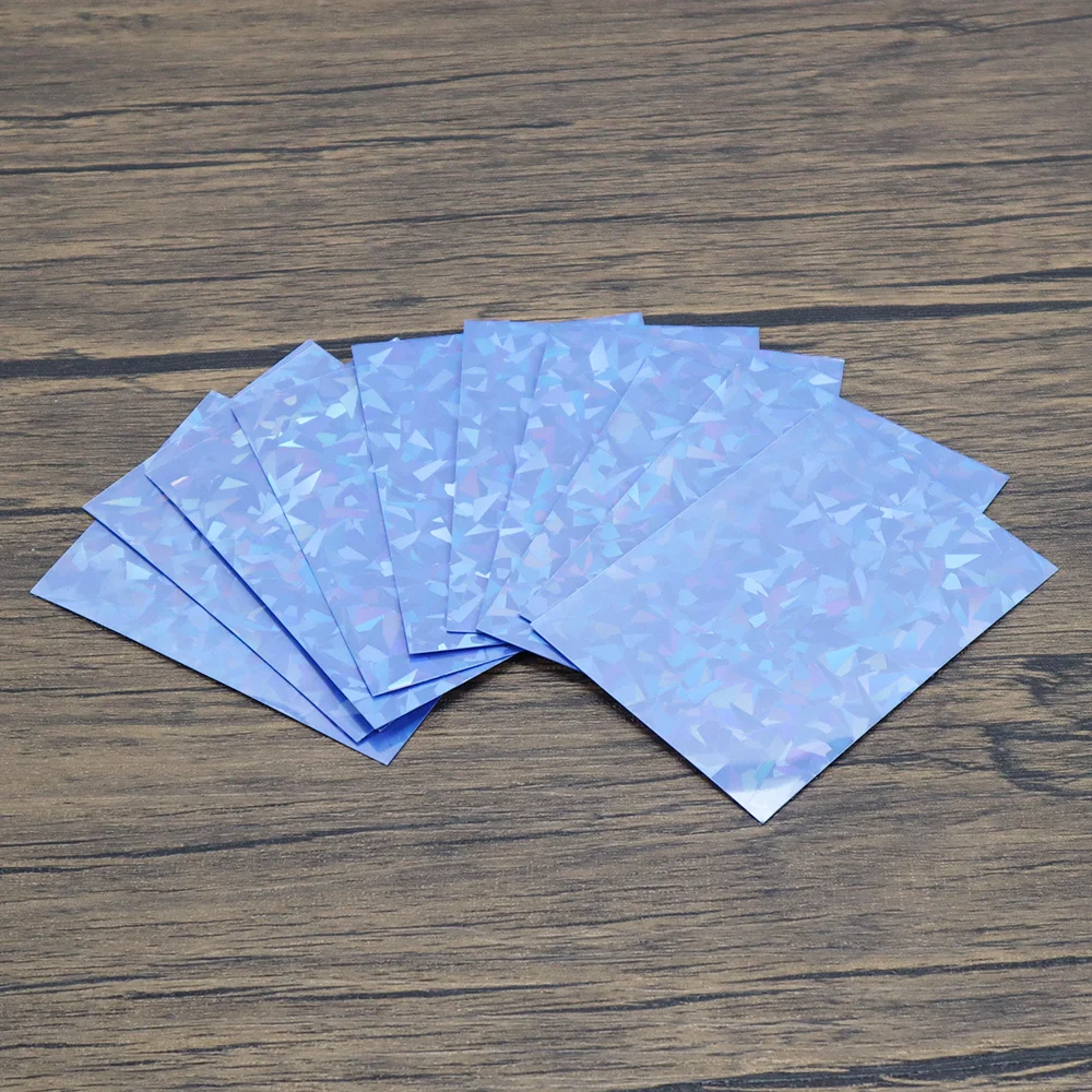 

100Pcs/Set 66x91mm Blue Matte Laser Gemstone Glass Broken Flashing Sleeves Idol Photo Holographic Protector Cards Shield Cover