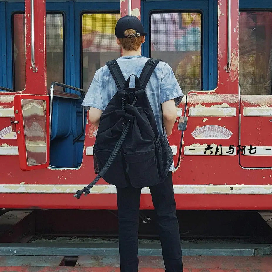 

2022 Korea niche raucohouse backpack canvas drawstring backpack Tide brand men's bag college schoolbag travel bag.
