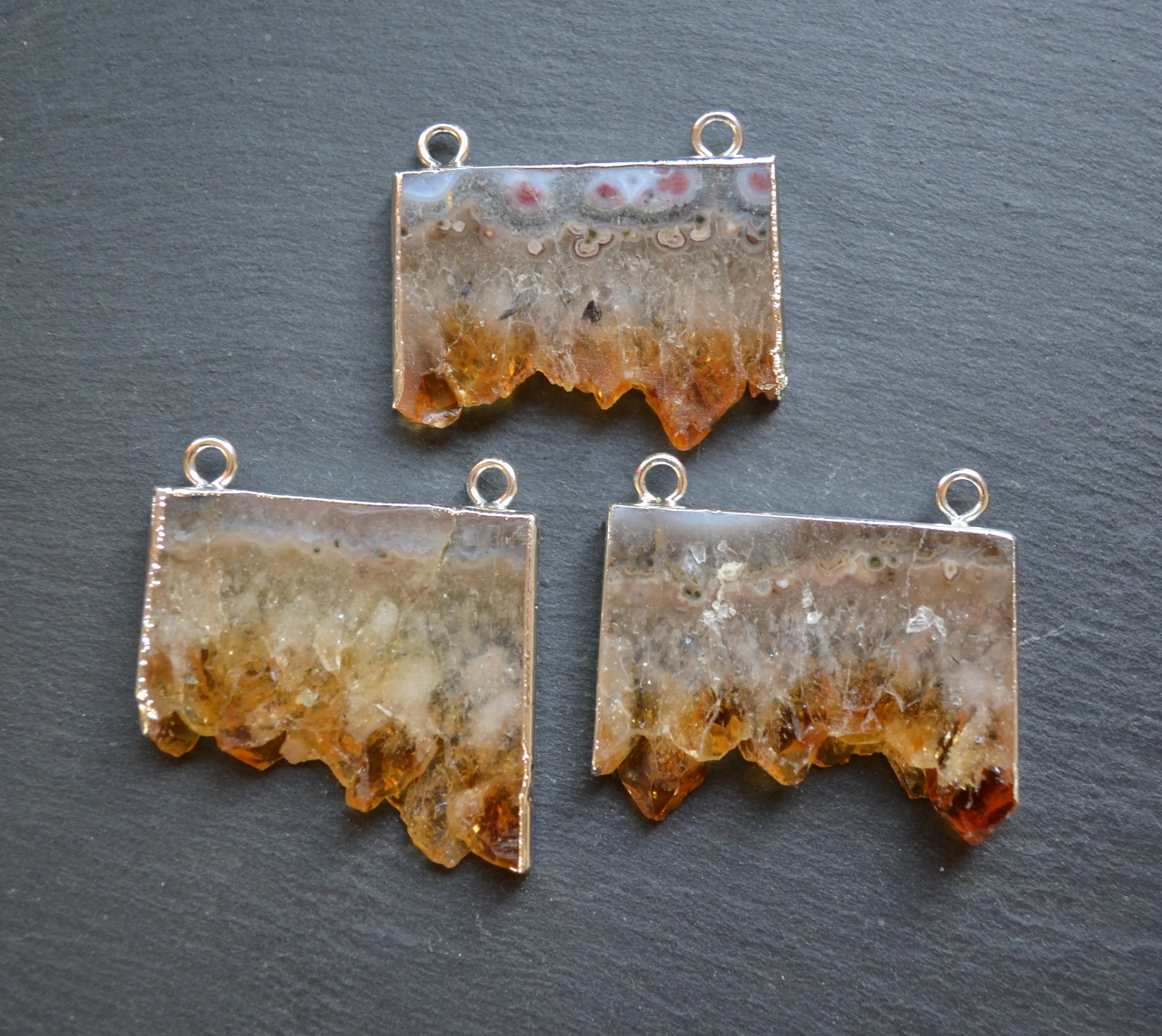 

Yellow agates slice pendants with Silvery edges ,yellow citrine quartz charms