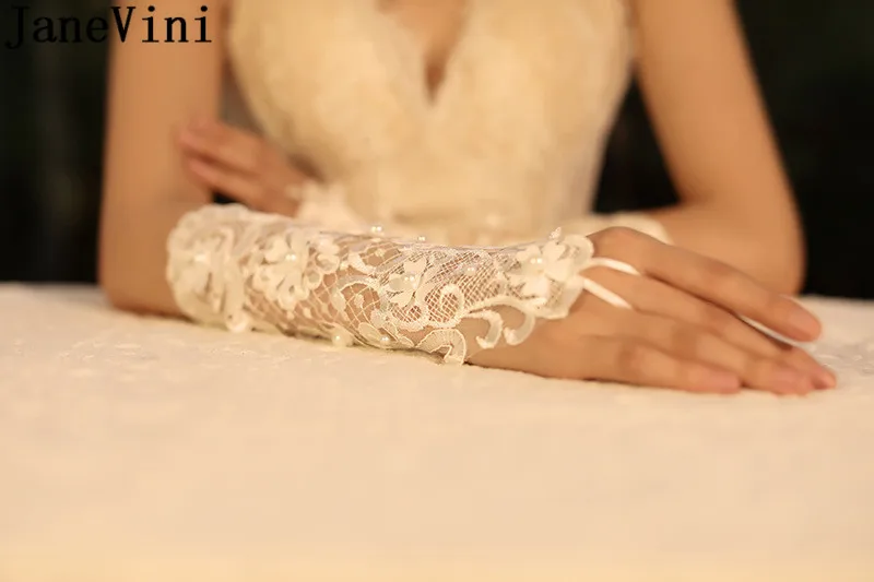 JaneVini-guantes de novia largos sin dedos, guantes blancos con perlas de encaje, accesorios de boda con flor de lacu-up, abendshandschuhe 2020