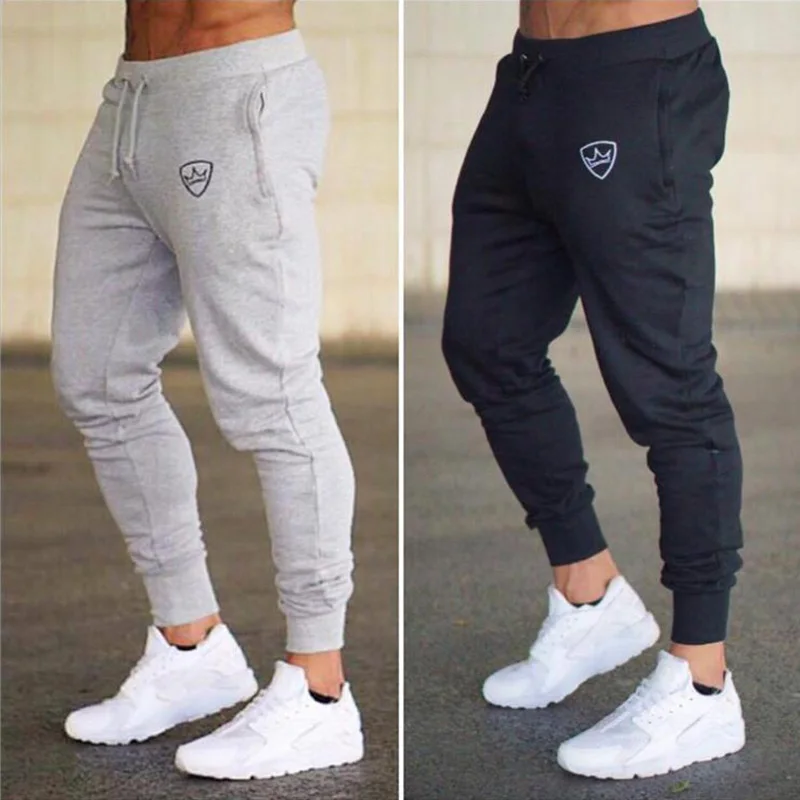 Pantalones de chándal ajustados para hombre, pantalón largo de algodón, informal, a la moda, para gimnasio y Fitness, 2019