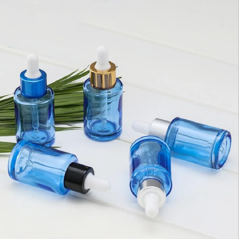 

30ML transparent blue glass dropper bottle with serum/emulsion/essence/essential oil/liquid/water dropper cosmetic packing