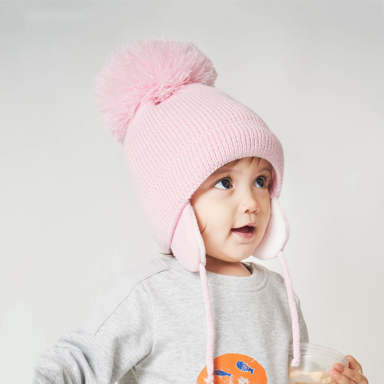 

Kids Baby Winter Earflap Hat Infant Toddler Boys Girls Solid Big Pompom Hat Fleece Lined Warm Beanie Hat Children Chin Strap Hat